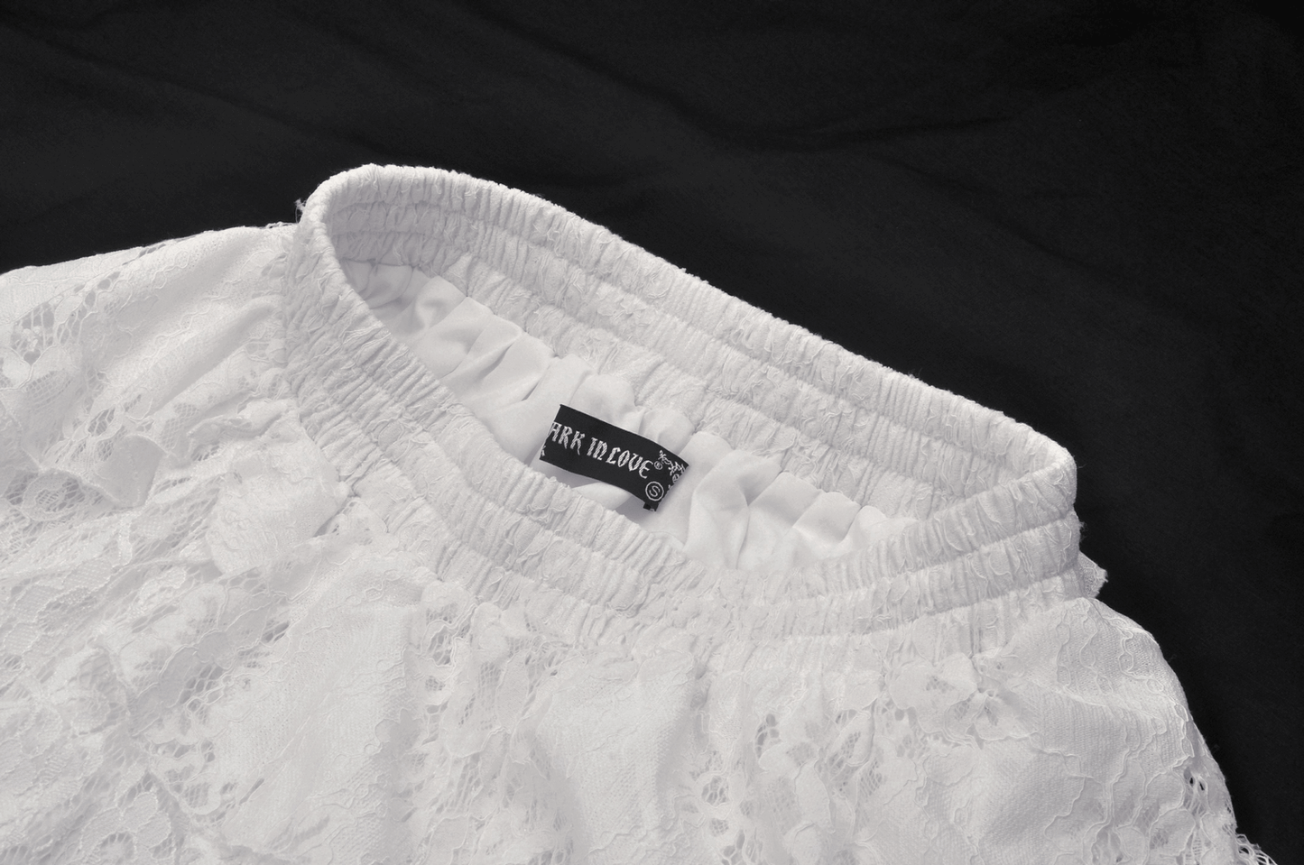 Angelic Women's Lace Mini Skirt with Layered Ruffles