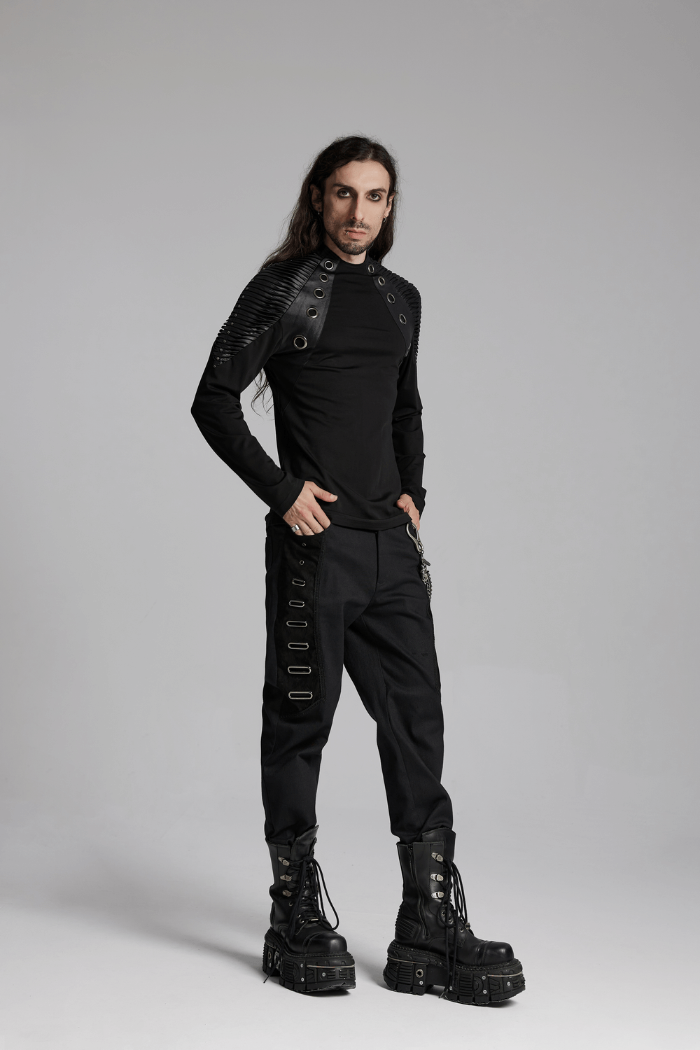 Black Long-Sleeved Top with Leather Accents and Rivets