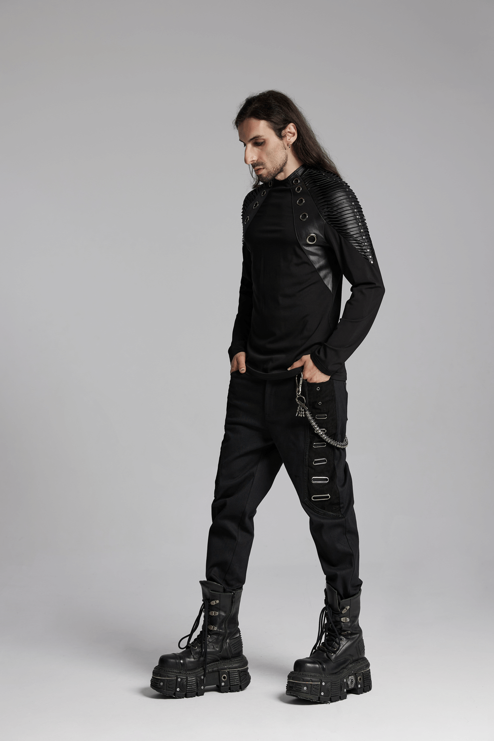 Black Long-Sleeved Top with Leather Accents and Rivets
